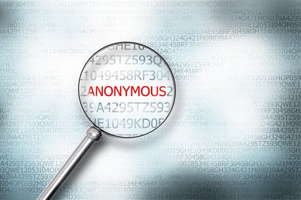 free paid vpn service magnifying glass over red anonymous word